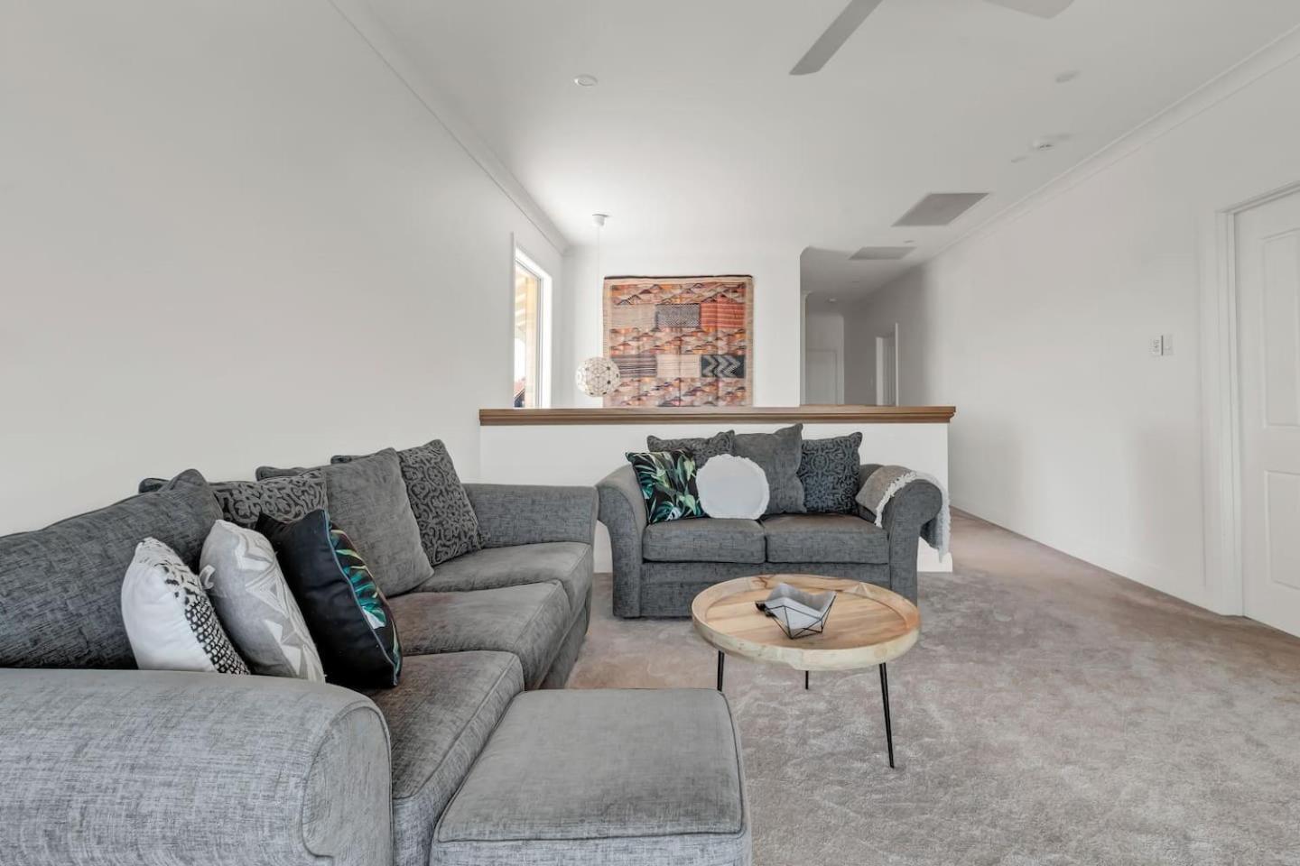 Holiday home Beachfront At Sandpiper - A Spacious Coastal Escape *